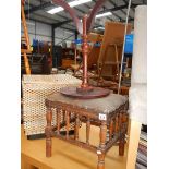 A piano stool and a tripod table.