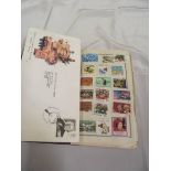 A Normandy stamp album and contents