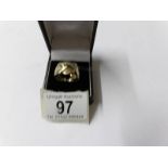 A gent's gold puzzle ring, size R, approximately 12 grams.