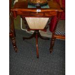 A Victorian mahogany sewing table.