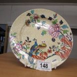 A Spode hand painted plate decorated with birds. 20 cm diameter.