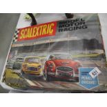 A Triang Scalextric set 65 model racing set with Austin Healey and Mercedes.