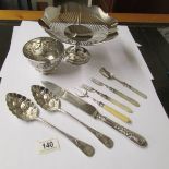 A small embossed silver bowl (67 grams), a silver plate comport,