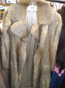 A fur coat. (in good condition).