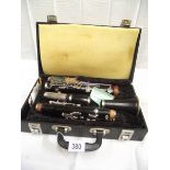 A cased clarinet,