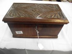 A good carved wood box with key (does not lock)