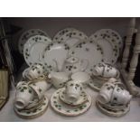 In excess of 50 pieces of Colclough tea and dinner ware including teapot.