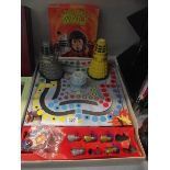 A classic Doctor Who board game (missing lid), a Dalek and one other Doctor Who game.
