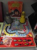 A classic Doctor Who board game (missing lid), a Dalek and one other Doctor Who game.