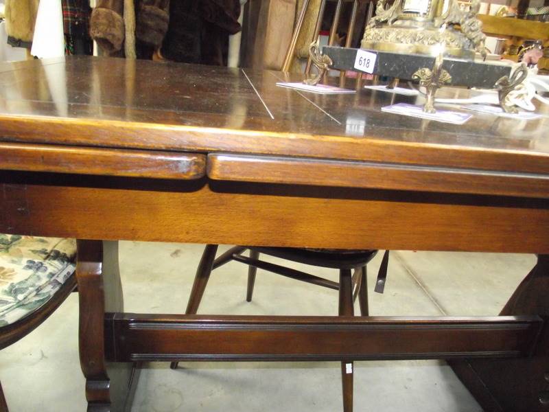 A dark oak draw leaf table and 4 Ercol chairs. - Image 3 of 4