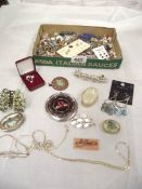 A quantity of assorted earrings, rings, pill boxes etc.