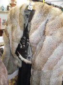 A fur cape (in good condition).