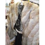 A fur cape (in good condition).