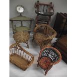 A quantity of vintage wicker and wood doll's furniture.