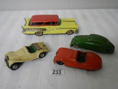 2 tinplate Scalex friction cars, a Bandai American estate car and one other.