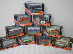 Eight die cast Corgi bus models.