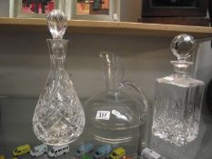 3 Decanters including Edinburgh crystal.