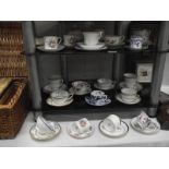 A mixed lot of 19th and 20th century porcelain cups and saucers.