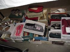 A good selection of boxed vintage ladies shoes.