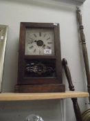 An American style mantle clock, one spring overwound.