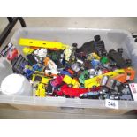 A large box of loose die cast including Matchbox, Corgi, Dinky, Majestic etc.