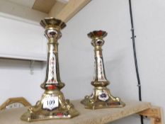 A pair of China candlesticks.