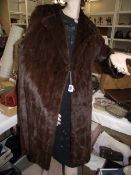 A fine quality full length coat made by M Michaels Furs, Bristol, vintage. (in good condition).