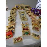 A large quantity of boxed Lledo die cast models (40 in total).