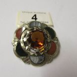 A multi coloured agate set vintage Scottish brooch, tests as silver.