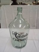 A glass bottle jar with O'Connols chemist Dublin advertising lettering