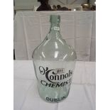 A glass bottle jar with O'Connols chemist Dublin advertising lettering