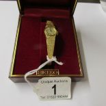 A boxed Seiko make ladies wrist watch in yellow metal.