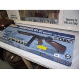 A boxed Airsoft Thompson M1A1 military gun