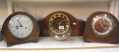 Three 1930's oak mantle clocks (glass on 1 is loose)