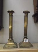 A pair of brass reeded column candle sticks ****Condition report**** Made by 'WMF'