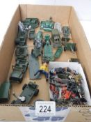 A quantity of mixed diecast military vehicles and lead soldiers including Lesney, Britains,