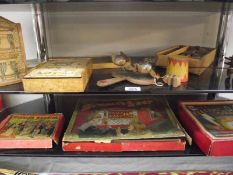 2 shelves of early - mid 20th century children's wooden games and toys.