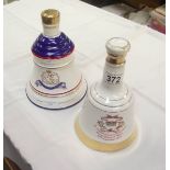 2 unopened Wade Bells Whisky decanters commemorating the birth of Prince Henry and Princess