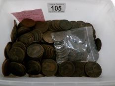 A box of Victorian and Edwardian copper pennies.