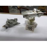 A 1950's Civil Service Motoring association car badge and a racing car trophy.