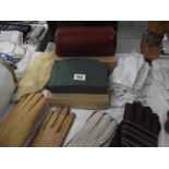 A quantity of gloves, vintage set etc.