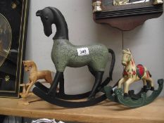 2 small wooden rocking horses,