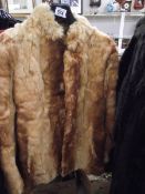 A fur jacket. (in good condition).