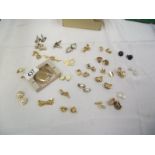 A mixed lot of cuff links and clip on earrings etc.