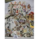 Approximately 200 loose tea and cigarette cards including Wills, Players, Gallaher etc.