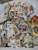 Approximately 200 loose tea and cigarette cards including Wills, Players, Gallaher etc.