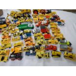Approximately 75 construction themed die cast vehicles.