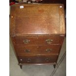 A 1930's oak bureau.