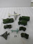 A quantity of Dinky military vehicles including aircraft.