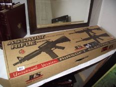 A boxed Airsoft assault rifle ICS